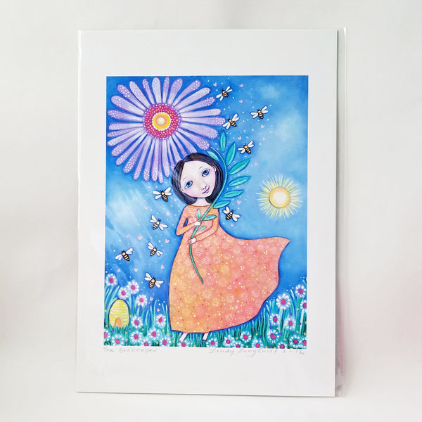 Beekeper pendant necklace. The beauty of bees was captured in this original piece by Lindy Longhurst. The artist captures every aspect of what we love about bees in a fanciful and poetic manner.  We offer "The Beekeeper" in pendants and picture sized prints made by the artist.  The size of the print is 21 x 29cm (8.25 x 11.5 inches) with the actual image size 16.5 x 22cm (6.5 x 8.7 inches). Ships in a Priority Mail Envelope.  Necklace Pendant is 1.5" X 1.25, brass and silver