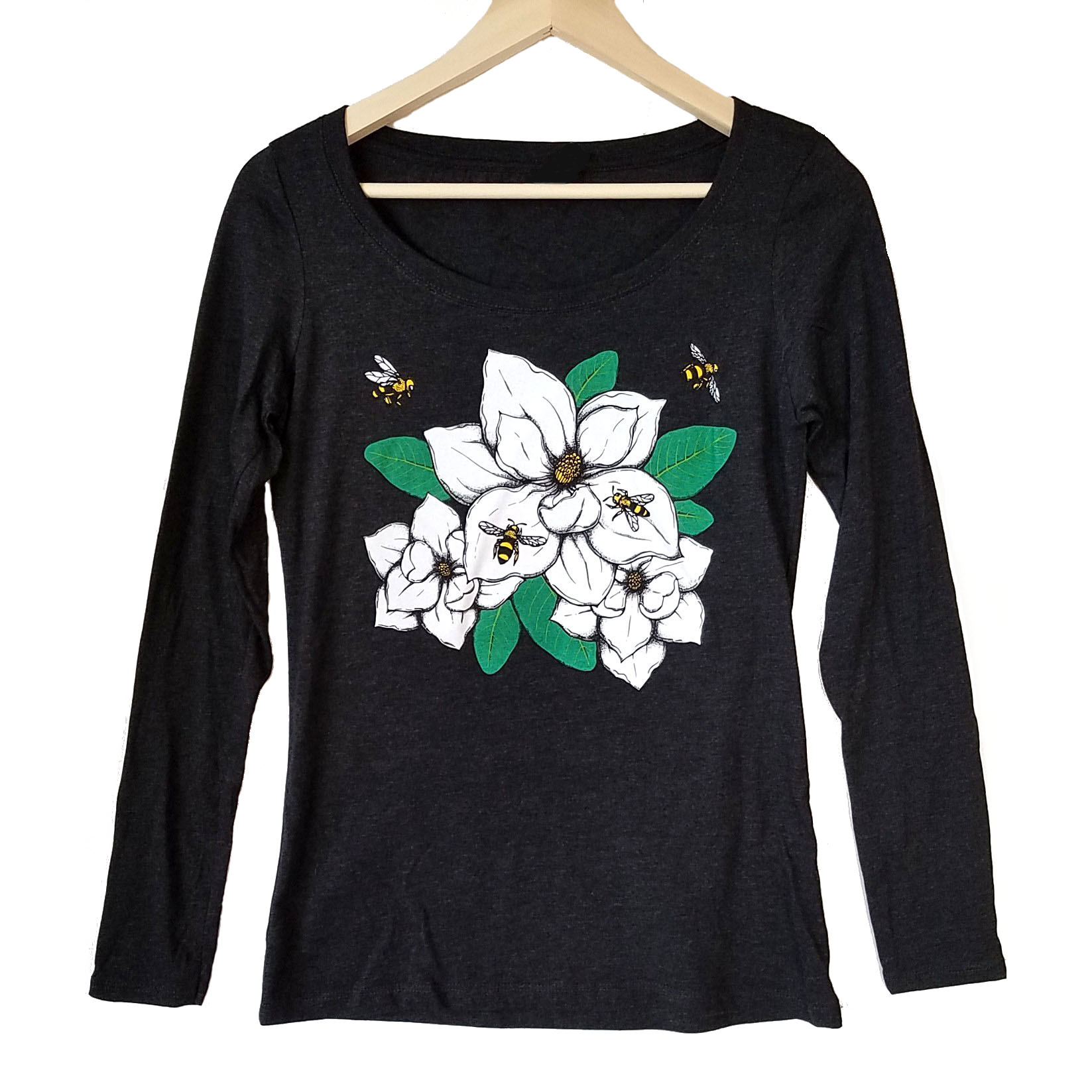 Magnolia & Honey Bees Women's T-shirt. Stay warm this fall with our gorgeous new long sleeve shirts. Featuring our new original design that captures the beauty of the Southern Magnolia and bees collecting pollen. So realistic, you can smell the sweetness.   Buttery soft triblend, preshrunk, true to size.  We gift a package of pollinator wildflower seeds with every shirt purchase. Help provide nectar, pollen and shelter to our beloved pollinators.   We Love Bees!!