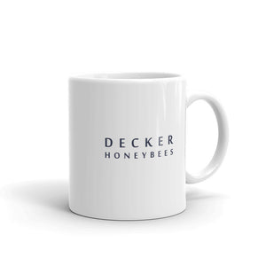 Decker Honeybees Daisy Heart Mug. Whether you're drinking your morning coffee, your evening tea, or something in between – this mug's for you! It's sturdy and glossy with beautiful original art that'll withstand the microwave and dishwasher. Just add honey! Ceramic. Dishwasher and microwave safe. White and glossy