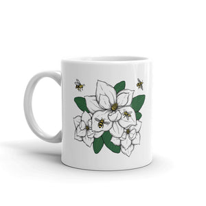Decker Honeybees Magnolia Mug. Whether you're drinking your morning coffee, your evening tea, or something in between – this mug's for you! It's sturdy and glossy with our new original design. Just add honey! Ceramic. Dishwasher and microwave safe. White and glossy